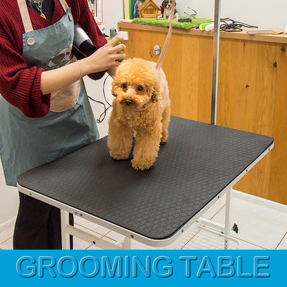 Large 24 × 36 inch anthracite grooming mat covering a professional grooming table