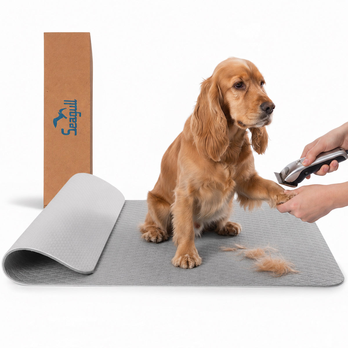 Light grey non-slip dog grooming table mat with dog and grooming clippers