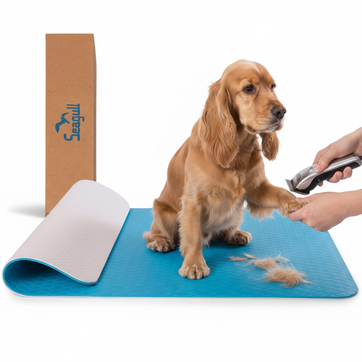 Light blue non-slip dog grooming table mat with dog and grooming clippers