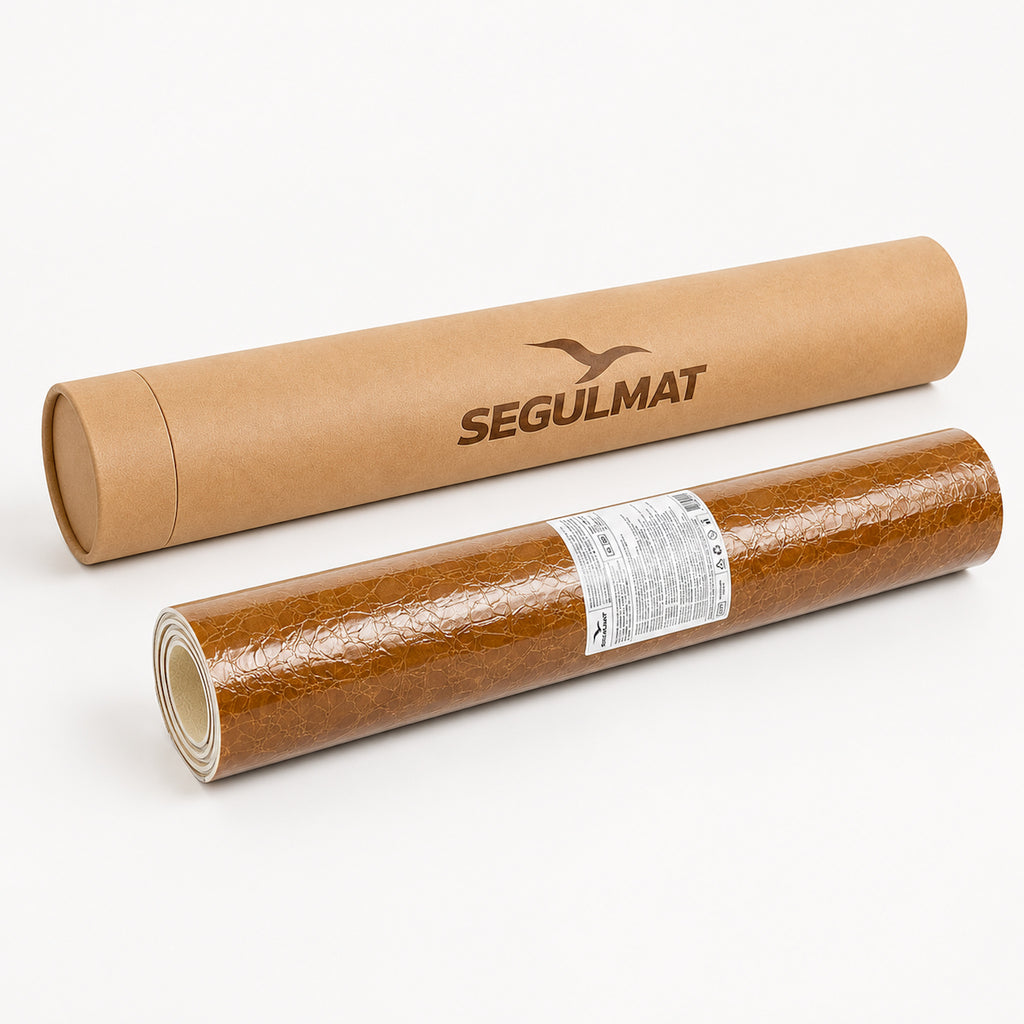 Rolled Premium Home dog grooming table mat in protective wrap with product label beside branded SEGULMAT kraft tube