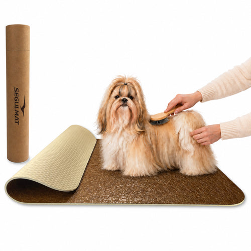 Caramel brown Premium dog grooming table mat, PU faux leather top, foam rubber backing, dog being brushed and kraft tube